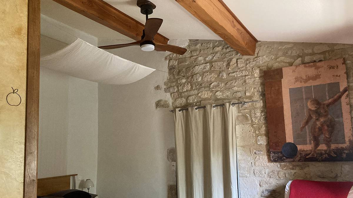 The ceiling fan in the third bedroom