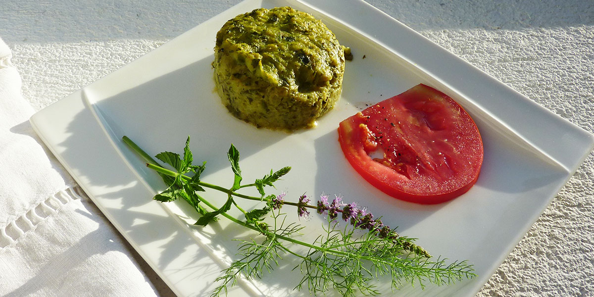 Zucchini timbale with hot goat cheese