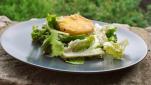 The host table of the Mas d'Issoire: Warm goat cheese on salad