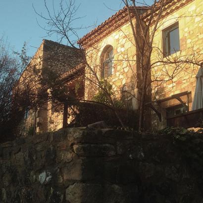 The facade of the guest rooms of the Mas d'Issoire in winter