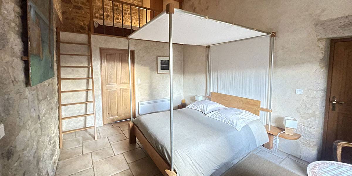 The guest rooms at the mas d Issoire: A vue of the bedroom on the first step floor